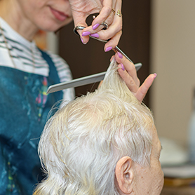 resident getting a haircut