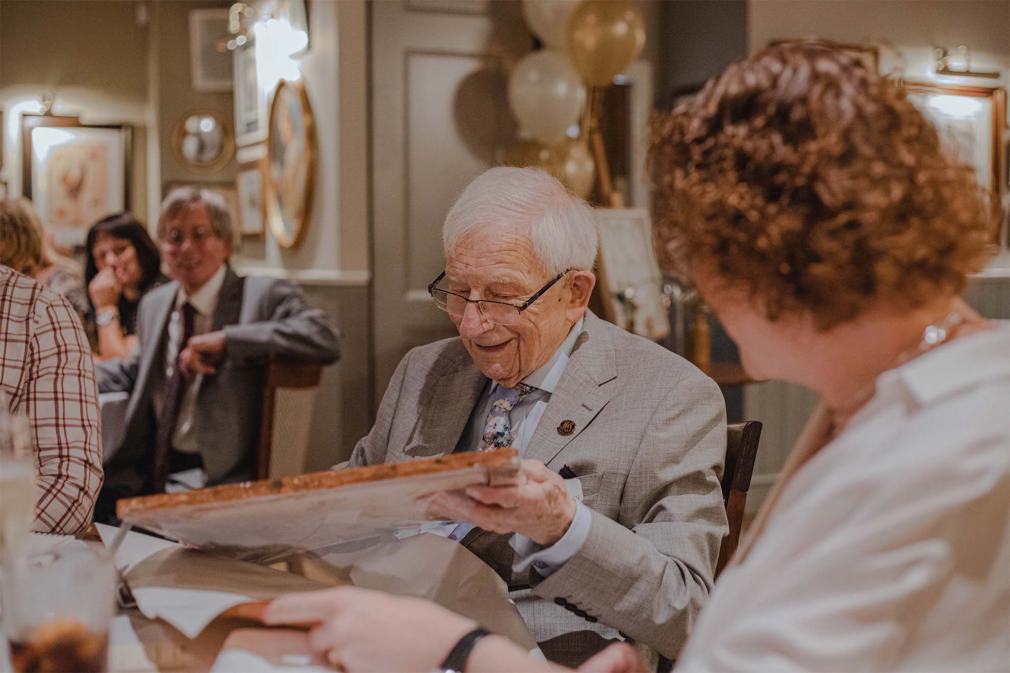 resident celebrating their birthday with loved ones