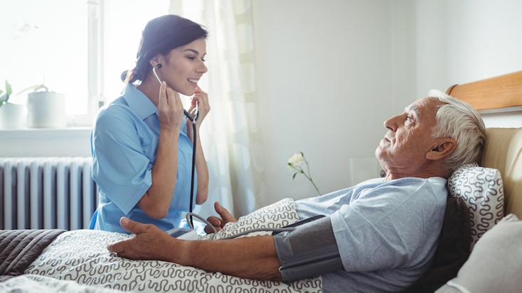 resident having their blood pressure taken