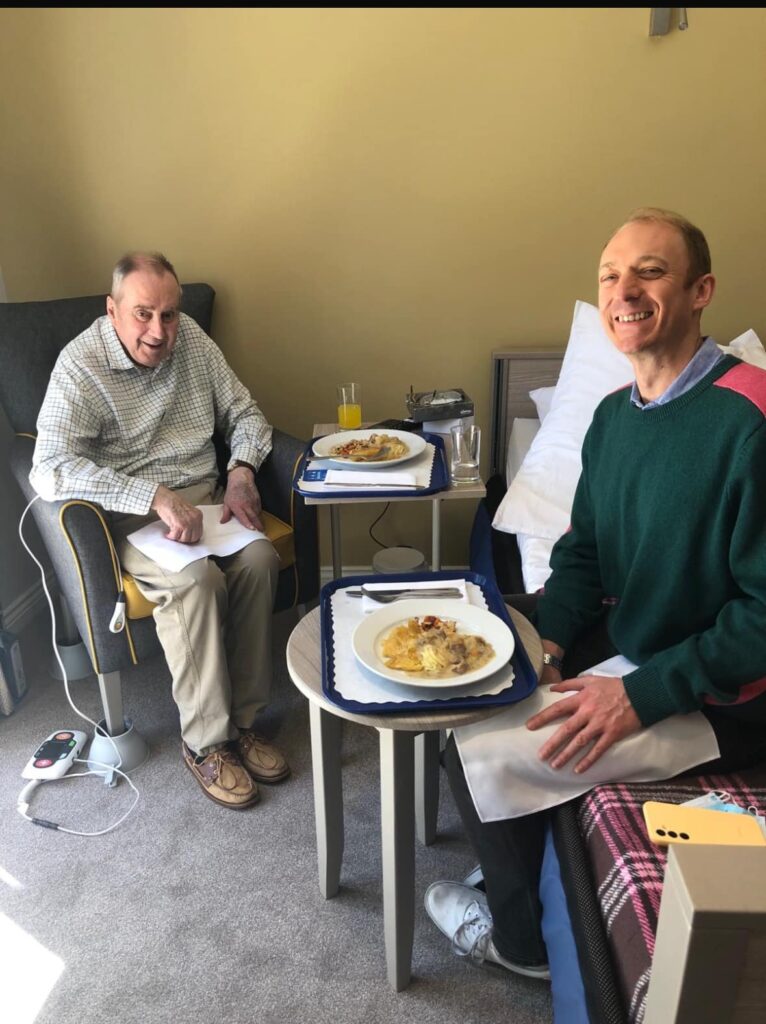 resident dining with a family member