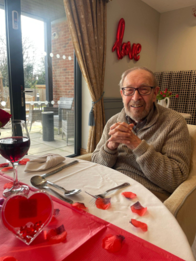 resident couple enjoying a meal together