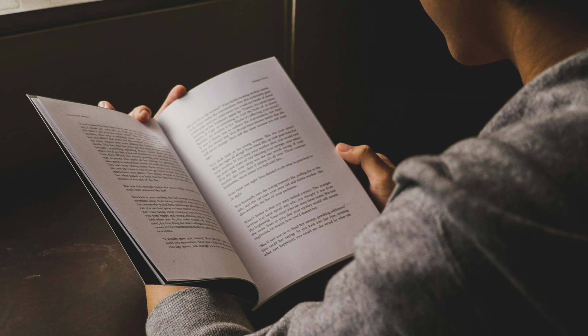 Woman holding an open book