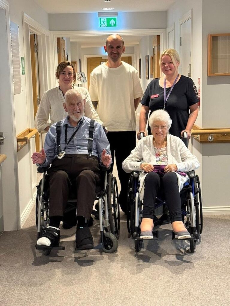 group photo of residents and carers