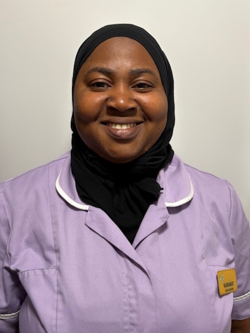one of our care assistants in her uniform